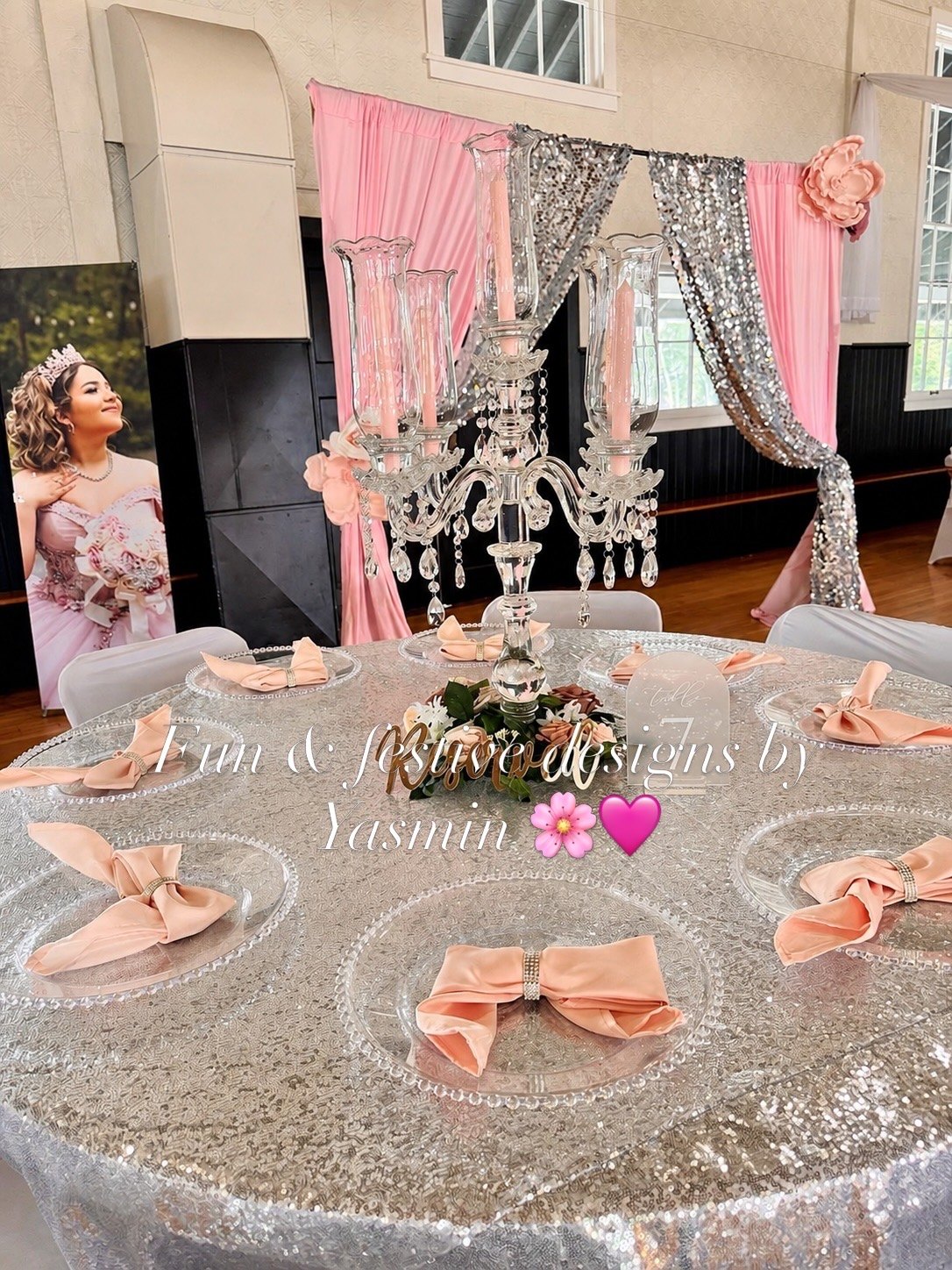 Pink and silver reception table styling with floral accents