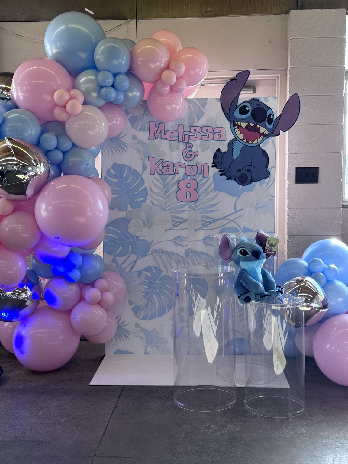 Pastel birthday magic with pink and blue balloons and a personalized Stitch theme